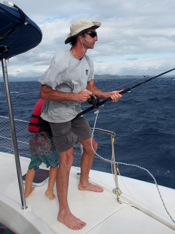 Andrew trying his luck at fishing