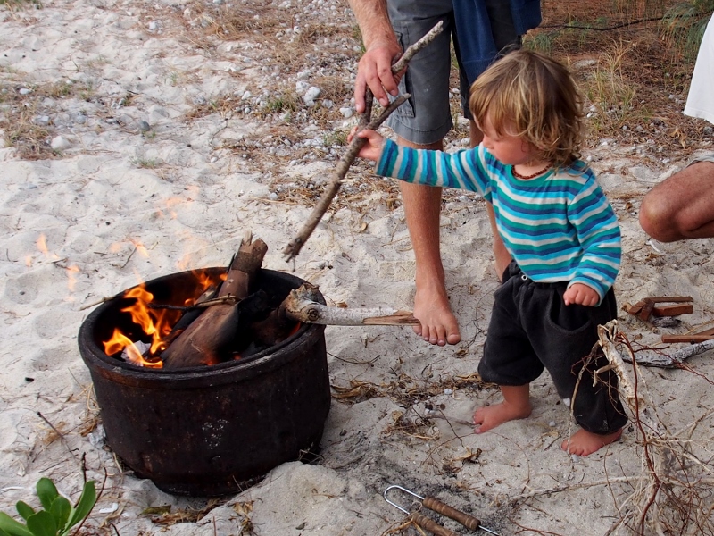 Alec tending to the fire