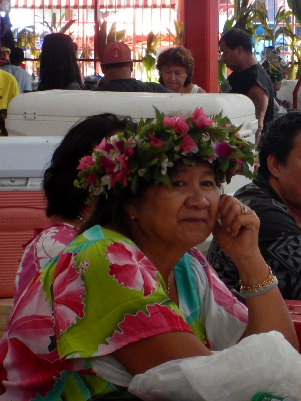 Lady selling vegetables in the Pape'ete market